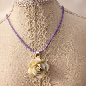 Elegant Cream Rose Necklace on Purple Cord